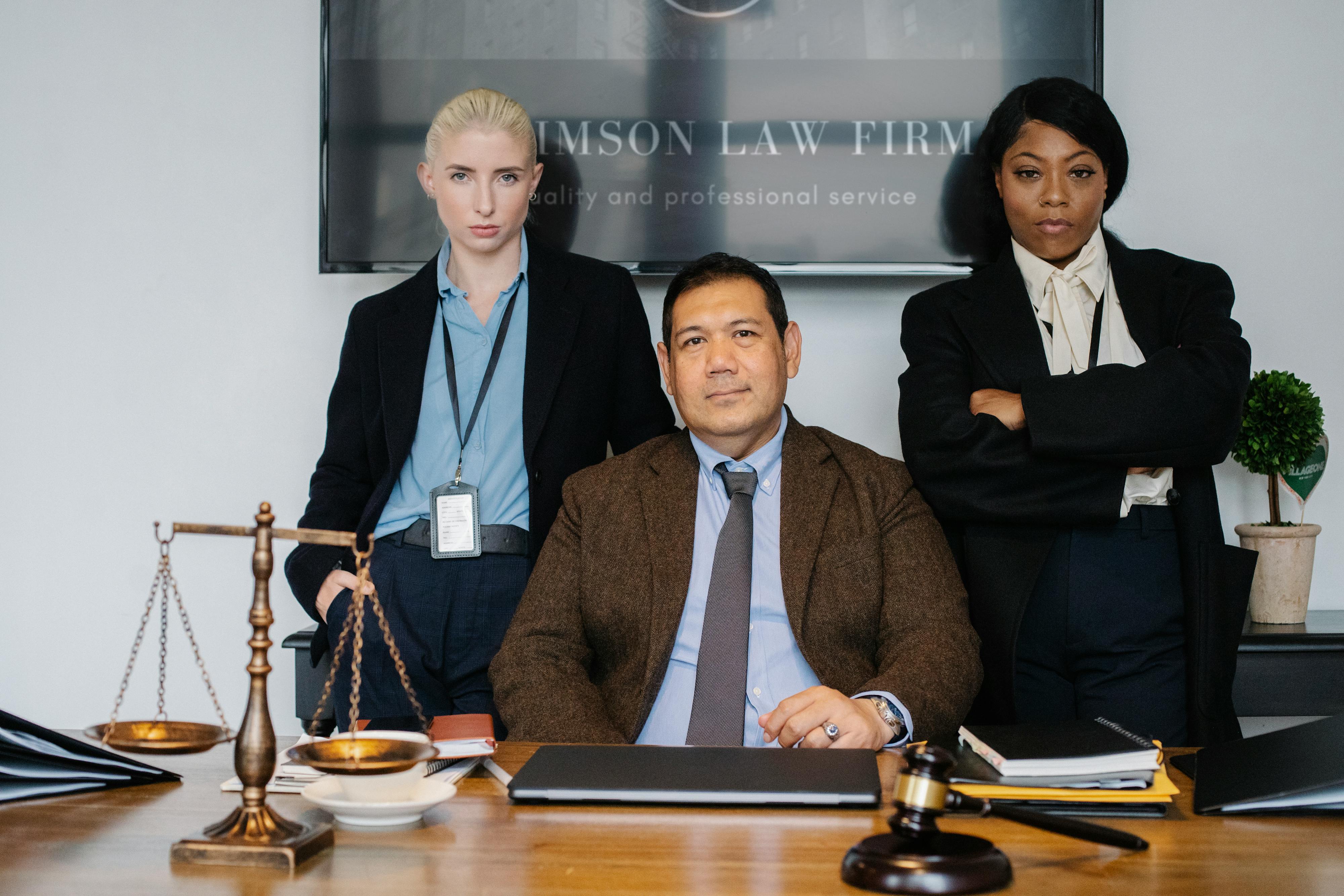 Law firm team at desk